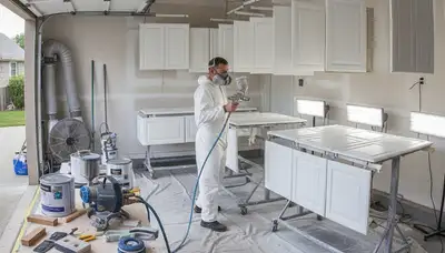 Professional cabinet painting process using spray and brush techniques in Pittsburgh, PA kitchen