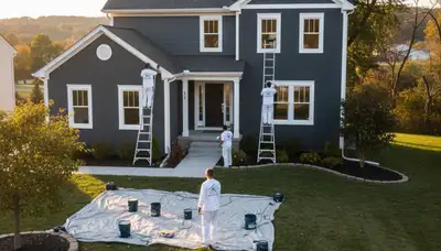 Professional house painters working on exterior home repaint in Pittsburgh, PA